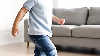 : “Kid Wearing Dad’s Huge Shoes and Trying to Walk Normally