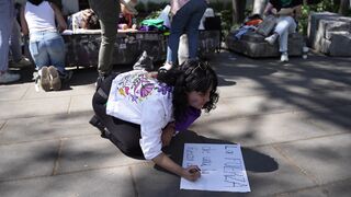 The Shy Snow Woman and the Cursed Ring - empowering latina creating a sign outdoors | Trending