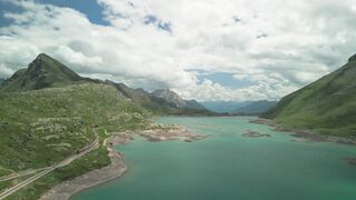 WallPics - 4K Wallpapers - aerial view of swiss alpine lake and mountains | Trending HD Video