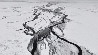 Winter Coat - iceland s winter aerial views of icy river | Trending HD Video