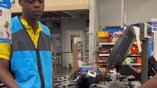 This customer is pranking the cashier by spinning the groceries on the checkout scanner so the payment process takes longer.????????