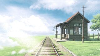 Serene Train Station in Green Landscape