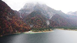 I Love Wallpaper - scenic drone view of alpine lake in autumn | Trending HD Video