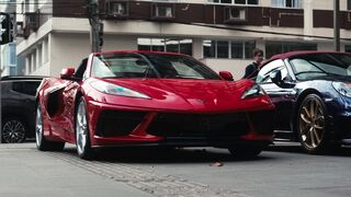 Electric car - vibrant red sports car in urban setting | Trending HD Video