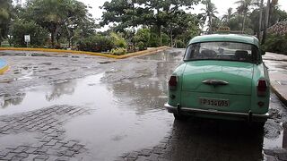 Carpet - view of cuban street on rainy day | Trending HD Video