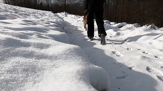 The Pioneer Woman - woman walking with her dog outside during winter | Trending HD Video