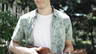 Funnyfuzzy - a man playing ukulele | Trending HD Video