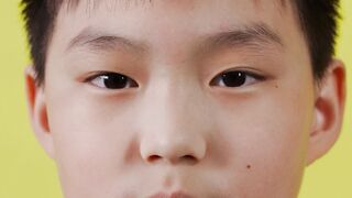 Funny Gift Ideas - closeup video of a boy smiling | Trending HD Video
