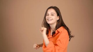 The Shy Snow Woman and the Cursed Ring - a woman in orange shirt is dancing happily | Trending