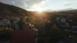 WallPics - 4K Wallpapers - serene village sunset over scenic countryside | Trending HD Video