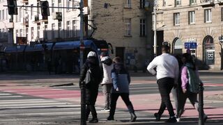 Funny Gift Ideas - busy city street with pedestrians and tram | Trending HD Video