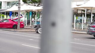 Electric car - vintage car on display at urban event | Trending HD Video