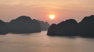 4K resolution - scenic halong bay at sunset with limestone peaks | Trending HD Video