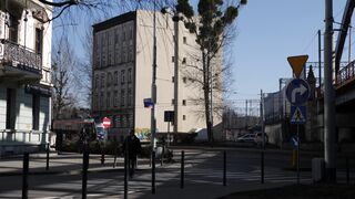 Funnyfuzzy - urban street scene with tram passing by buildings | Trending HD Video