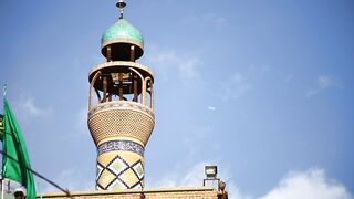 low angle footage of a building tower with traditional architectural design | Professional HD V