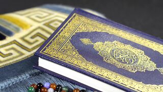 close up view of the quran and colorful prayer beads | Professional HD Video