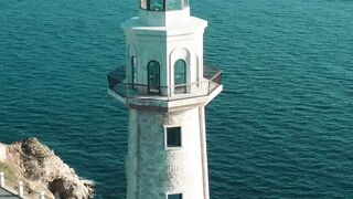 4K Computer Monitor - scenic aerial view of coastal lighthouse | Trending HD Video