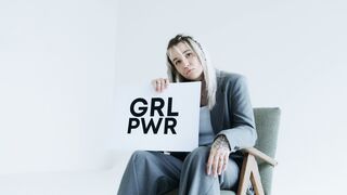 The Pioneer Woman - a woman holding a sign while sitting | Trending HD Video
