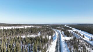 Travel Backpack - aerial footage of roads in a winter landscape | Trending HD Video