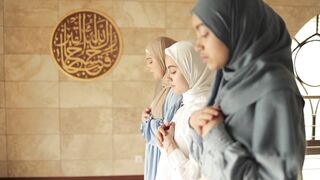 women praying in a mosque | Professional HD Video