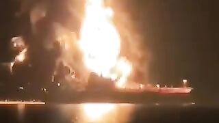 Ignition of fire in a “foreign” oil tanker after targeting it in  Iraq