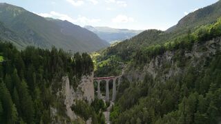 4K Computer Monitor - scenic aerial view of swiss landwasserviadukt | Trending HD Video