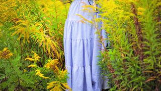 The Pioneer Woman - woman in blue dress posing in a lush garden | Trending HD Video