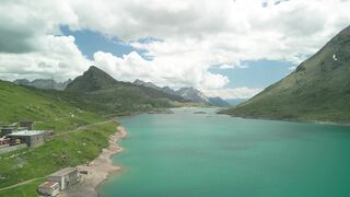 4K Computer Monitor - scenic drone view of alpine lake and mountains | Trending HD Video