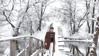 Winter Coat - a couple walking on a snow covered bridge | Trending HD Video
