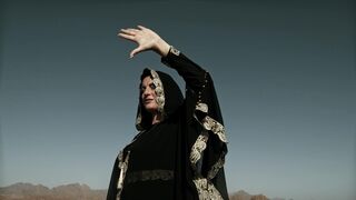 Woman - woman posing in the desert wearing traditional abaya | Trending HD Video