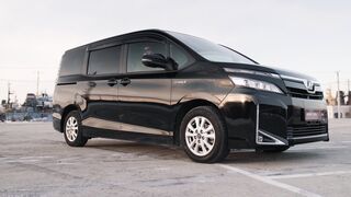 Carrefour - mini van on parking lot | Trending HD Video