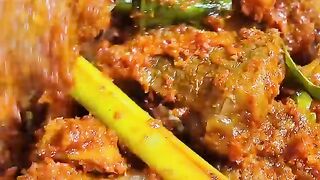 COOKING RENDANG DISH