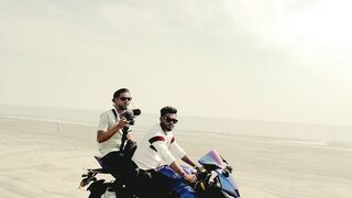 Funnyfuzzy - videographer filming on motorcycle in desert | Trending HD Video