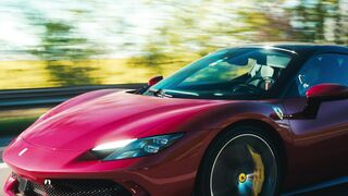 Cartier - sleek red sports car on scenic highway | Trending HD Video