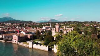 Travel Backpack - blue ocean near the brown castle | Trending HD Video