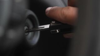 Cartier - a person starting the engine of the car | Trending HD Video