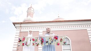 women smiling while wearing hijab outside the mosque | Professional HD Video