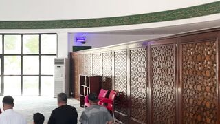 The Wedding People A Novel - serene mosque interior with praying people | Trending HD Video