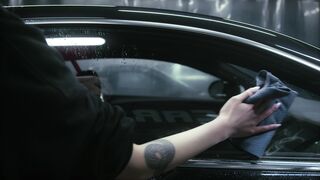 Carrefour - a person cleaning the car | Trending HD Video