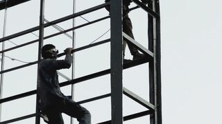 Funnyfuzzy - workers assembling metal structure at height | Trending HD Video