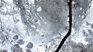 4K resolution - aerial view of cracked ice surface | Trending HD Video