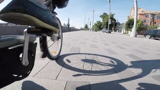 Travel Backpack - a person travelling the city by a bicycle | Trending HD Video