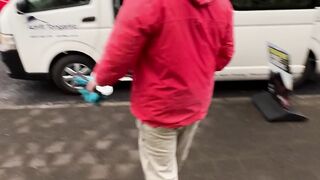 travelite - man boarding minibus in urban area | Trending HD Video