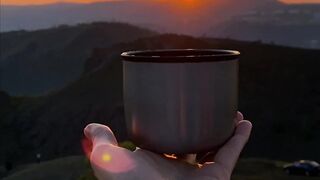 The Bold and the Beautiful - woman tossing a cup of coffee towards sun | Trending HD Video