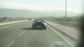 Carpet - a person driving a cabriolet car | Trending HD Video