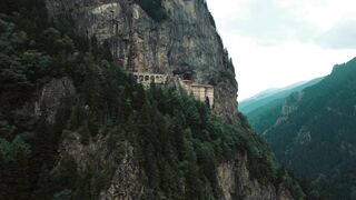 4K resolution - aerial view of sumela monastery in lush forest | Trending HD Video