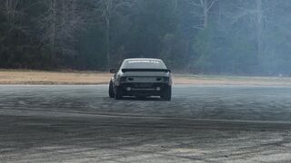 Cartier - a black car drifting on the road | Trending HD Video