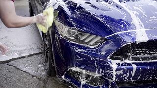 Notes on Being a Man - a man washing a car | Trending HD Video