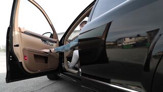 Electric car - a man pulling the door of his car to close | Trending HD Video