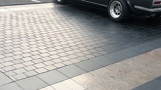 Electric car - classic car driving in urban morning light | Trending HD Video